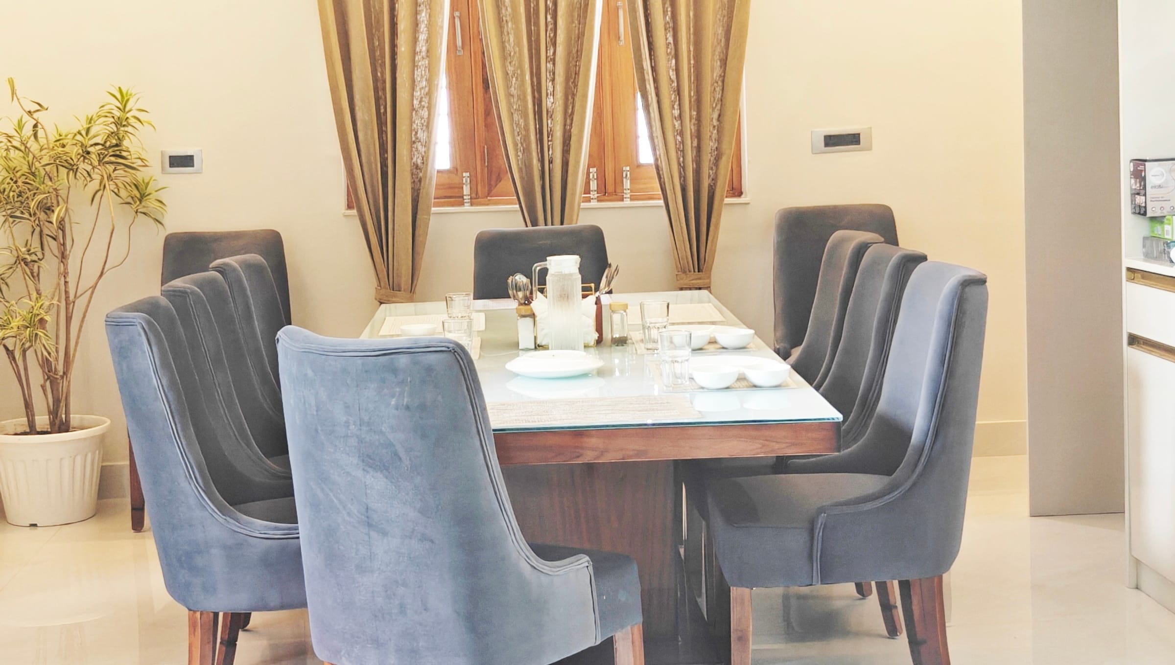 The dining room set for a meal